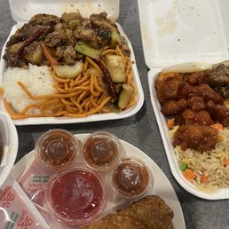 Chow mein, steamed House Special Fried Rice, potatoes and chicken, orange chicken, and chicken egg rolls Chow mein, steamed House Special Fried Rice, potatoes and chicken, orange chicken, and chicken egg rolls
