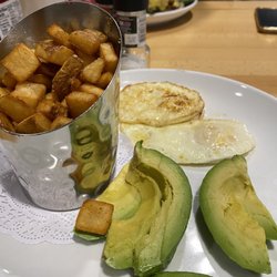 Brick & Spoon - All sides: Two eggs over easy a side of avocados and potatoes