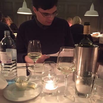Plachuttas Gasthaus zur Oper - Husband examining his menu. - Austrian Near Me - Vienna, 9 Plachuttas Gasthaus zur Oper - Husband examining his menu. - Austrian Near Me - Vienna, 9