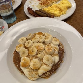 Denny's - Banana Cream specialty pancakes for extra $2.99 - Diners Near Me - Falls Church, Virginia Denny's - Banana Cream specialty pancakes for extra $2.99 - Diners Near Me - Falls Church, Virginia