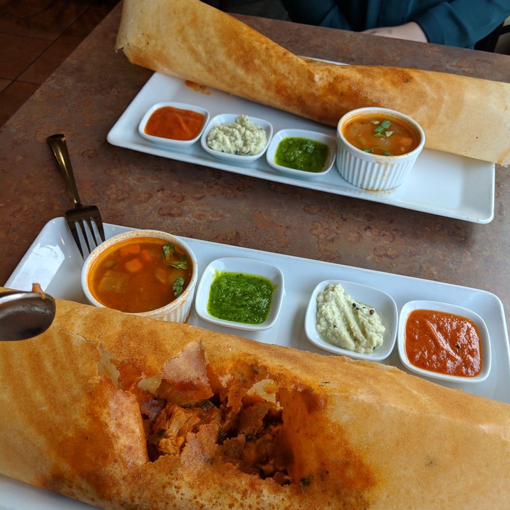 Dosa! Opened dosa is the vindaloo chicken dosa. Dosa! Opened dosa is the vindaloo chicken dosa.