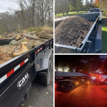 Twin River landscaping - a truck hauling a pile of wood - Landscaping Near Me