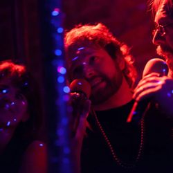 Kor Karaoke - In the cage at the Cat Club