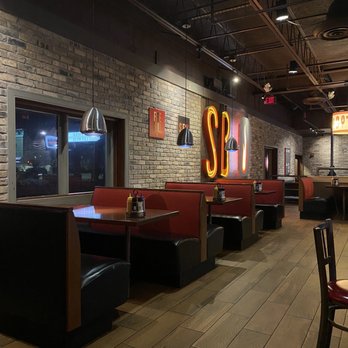 Smokey Bones - he interior of a restaurant - Barbeque Near Me - Orlando, Florida Smokey Bones - he interior of a restaurant - Barbeque Near Me - Orlando, Florida