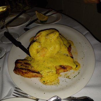 Seven Stars Inn - Lump Crab meat on chicken with potatoes au gratin. - Steakhouses Near Me - Phoenixville, Pennsylvania Seven Stars Inn - Lump Crab meat on chicken with potatoes au gratin. - Steakhouses Near Me - Phoenixville, Pennsylvania