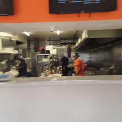 The Grilled Salmon Stand - Counter & cooking area