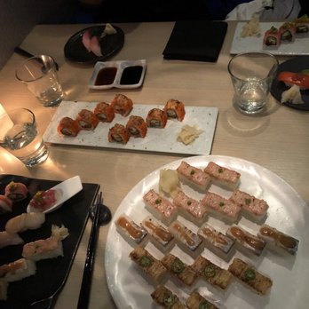Miku - Assortment of nigiri specialty plate, Miku roll, and aburi oshi sushi - Japanese Near Me - Vancouver, British Columbia