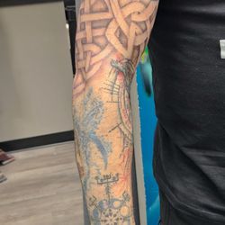 Village Tattoo - Upper arm work