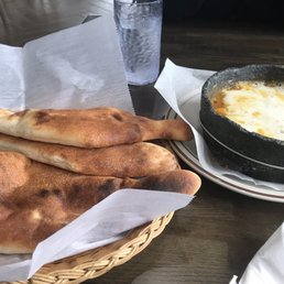 Saltah served with 3 pieces of clay bread - bubbling hot, great flavor Saltah served with 3 pieces of clay bread - bubbling hot, great flavor