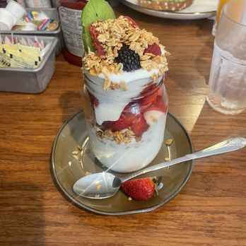 Eight AM - Yogurt parfait (avocado toast in the background) - New American Near Me - San Francisco, California Eight AM - Yogurt parfait (avocado toast in the background) - New American Near Me - San Francisco, California
