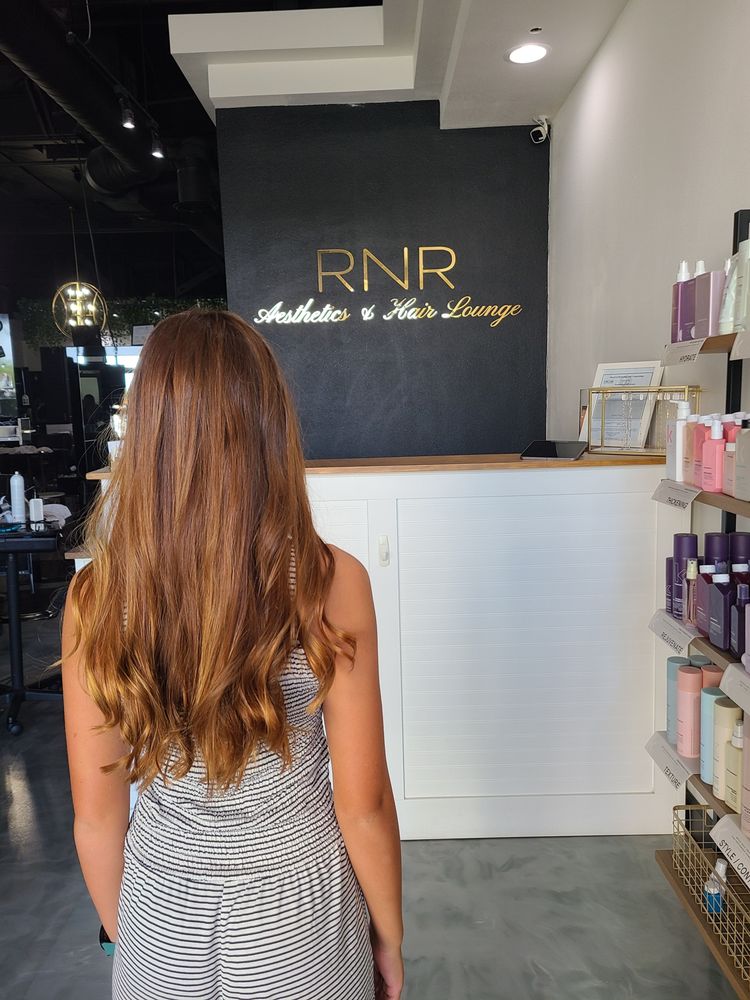RNR Aesthetics & Hair Lounge Logo