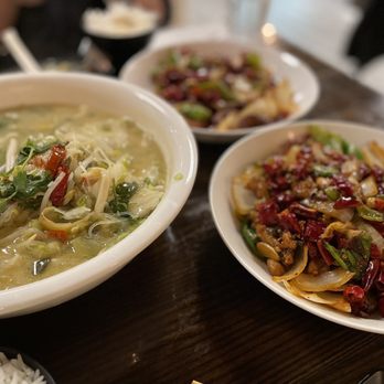 Our Zone - two bowls of soup and rice on a table - Szechuan Near Me - Boston, Massachusetts