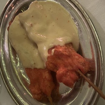 Mr. Chow - Chicken Satay appetizer. Comes with two pieces per order. - Chinese Near Me - Miami Beach, Florida Mr. Chow - Chicken Satay appetizer. Comes with two pieces per order. - Chinese Near Me - Miami Beach, Florida