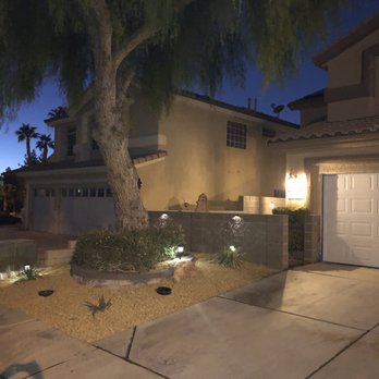 Green River Landscape - a driveway with a tree and lights - Irrigation Near Me Green River Landscape - a driveway with a tree and lights - Irrigation Near Me