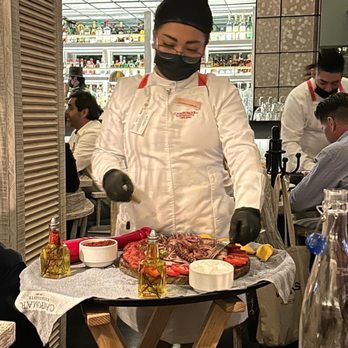Campomar - Dressing the octopus and tomato dish - Seafood Near Me - México, D.F., DIF