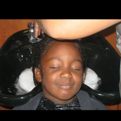 Styles By Ja'Net - lil lady enjoying her shampoo