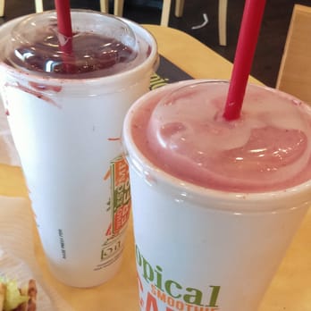 Tropical Smoothie Cafe - Dont worry, the berry bliss was served filled to the top. Boyfriend just couldnt wait for the picture. I don't blame him haha. So yummy! - Juice Bars & Smoothies Near Me - Davie, Florida Tropical Smoothie Cafe - Dont worry, the berry bliss was served filled to the top. Boyfriend just couldnt wait for the picture. I don't blame him haha. So yummy! - Juice Bars & Smoothies Near Me - Davie, Florida