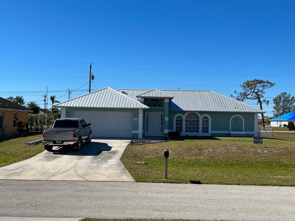Slide of Stanley's Roofing