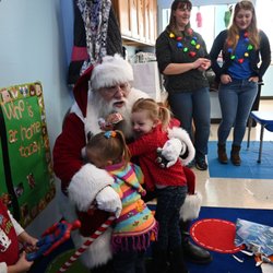 Santa visits preschool every December.