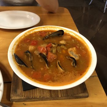 Trinity Common - Seafood gumbo. Mussels, Salmon, Tiny bay scallops, and Shrimp. - Bars Near Me - Toronto, Ontario