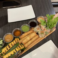 Ginger Thai - Sampler 19: chicken satay, dumplings, cheese rolls, soft spring rolls, crispy rolls