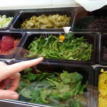 Subway - a person pointing at a display of vegetables - Sandwiches Near Me - Gosnell, Arkansas Subway - a person pointing at a display of vegetables - Sandwiches Near Me - Gosnell, Arkansas