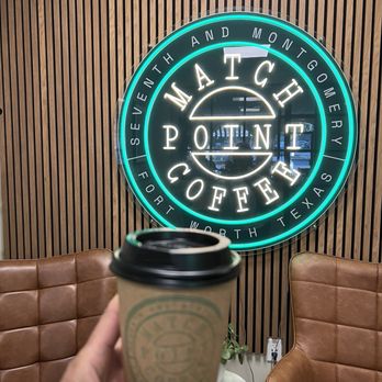 Match Point Coffee - Signage in the podcast room with vanilla latte. - Coffee & Tea Near Me - Fort Worth, Texas