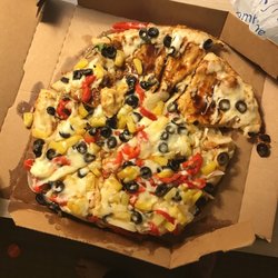 Domino's Pizza - Uncooked, cheese sliding off. The box is completely falling apart because god only knows why.