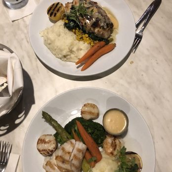 Latitudes - Stuffed grouper with polenta and spinach and seafood Trio with two shrimp scallops mahi-mahi over mashed potatoes and vegetables - Seafood Near Me - Highland Beach, Florida