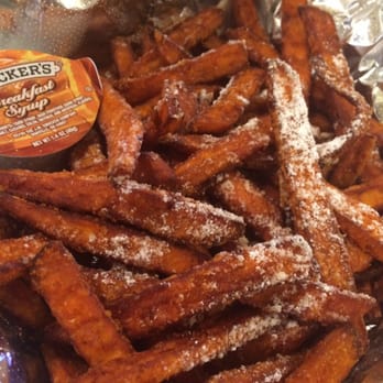 Turtle Bay - "Crack Fries"--- warm Sweet potato fries topped with powdered sugar, served with a side of syrup. - Pizza Near Me - New Orleans, Louisiana Turtle Bay - "Crack Fries"--- warm Sweet potato fries topped with powdered sugar, served with a side of syrup. - Pizza Near Me - New Orleans, Louisiana