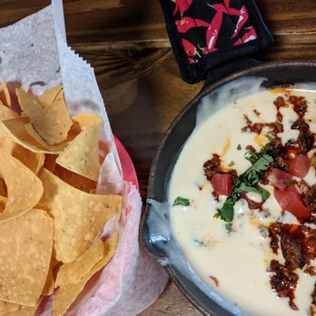 Pan Filo's - Question with chorizo and chips.  All nice and warm and served in the skillet. - Cocktail Bars Near Me - Clearwater Beach, Florida