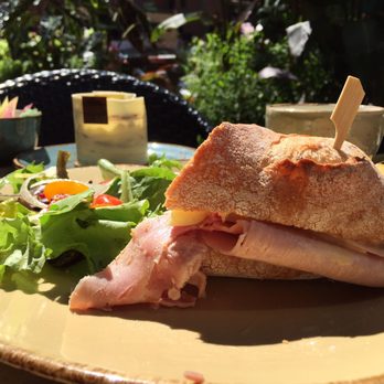 Pierrot Gourmet - 1/2 baguette jamon with Brie cheese, small side salad and sweet honey mustard. - Coffee & Tea Near Me - Chicago, Illinois Pierrot Gourmet - 1/2 baguette jamon with Brie cheese, small side salad and sweet honey mustard. - Coffee & Tea Near Me - Chicago, Illinois