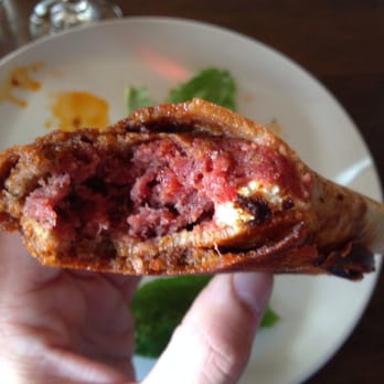 Ghenet Brooklyn - Kitfo Tiklil, steak tart rolled in kategna. It tastes like a pepperoni pizza... - Ethiopian Near Me - Brooklyn, New York