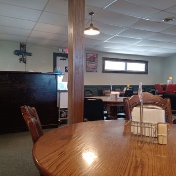 Road Runner Bar and Grill - a table and chairs - Burgers Near Me - Daykin, Nebraska Road Runner Bar and Grill - a table and chairs - Burgers Near Me - Daykin, Nebraska