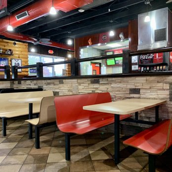 Cook Out - a table and benches in a restaurant - Burgers Near Me - Lexington, South Carolina Cook Out - a table and benches in a restaurant - Burgers Near Me - Lexington, South Carolina