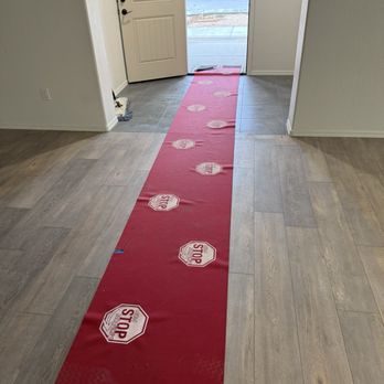 Non Stop Movers - Protecting our floor - Movers Near Me Non Stop Movers - Protecting our floor - Movers Near Me