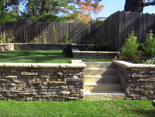 We're here to create your beautiful yard - Complete front yard design and installation of retaining wall, water feature and garden in Belmont We're here to create your beautiful yard - Complete front yard design and installation of retaining wall, water feature and garden in Belmont