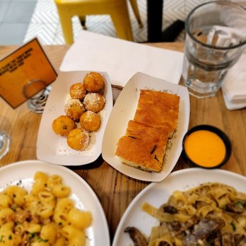 Forma Pasta Factory - arancini (fried risotto balls) and complimentary bread - Pasta Shops Near Me - Brooklyn, New York Forma Pasta Factory - arancini (fried risotto balls) and complimentary bread - Pasta Shops Near Me - Brooklyn, New York