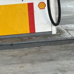 Shell - Probably hasn't been power washed in over a year - Arco a block down the street cleans pump stations every week