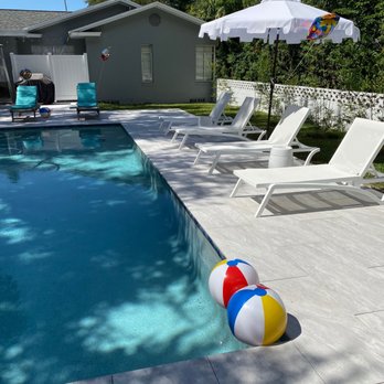 Lightning Pools & Pavers - Here's a beautiful new construction pool we did recently! - Pool & Hot Tub Service Near Me - Dunedin, Florida