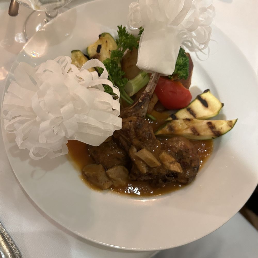 Restaurant Ermitage - a plate of food on a table - Russian Near Me - Montreal, Quebec Restaurant Ermitage - a plate of food on a table - Russian Near Me - Montreal, Quebec