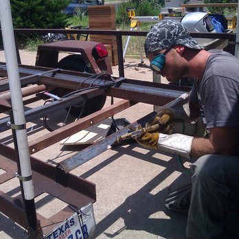 Handyman Matt - a man working on a metal structure - General Contractors Near Me Handyman Matt - a man working on a metal structure - General Contractors Near Me
