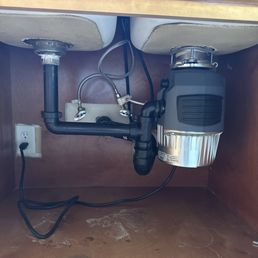 New garbage disposal and P traps installed New garbage disposal and P traps installed