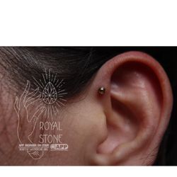 Royal Stone Piercing - Forward helix piercing with implant grade titanium/gold  hybrid end from Leroi fine jewelry