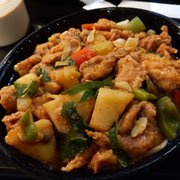 Photo of Dolans Uyghur Cuisine - Alhambra, CA, United States. Big plate chicken (with flat thick noodles underneath)