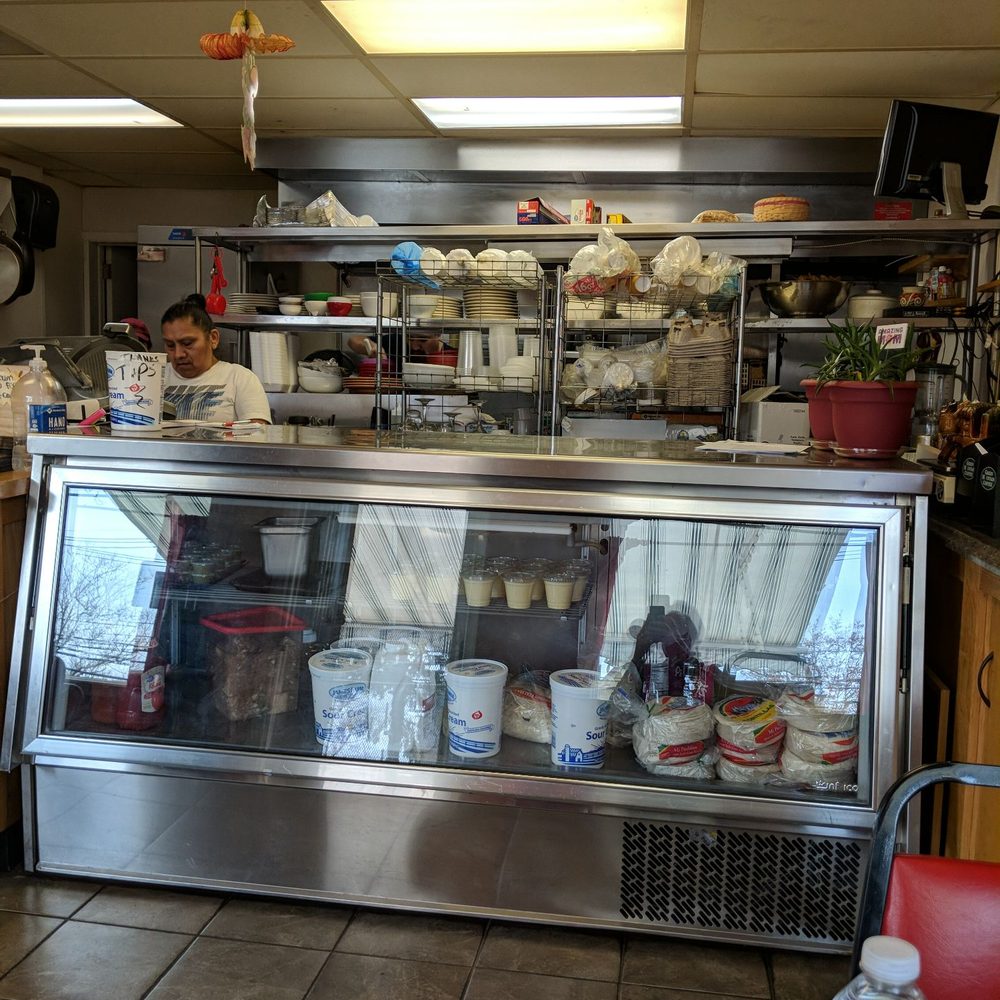 Totopos - a man behind the counter of a restaurant - Mexican Near Me - Lawrence Township, New Jersey Totopos - a man behind the counter of a restaurant - Mexican Near Me - Lawrence Township, New Jersey