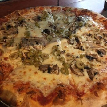 Wild Tomato - Small mushroom and olive pizza - Pizza Near Me - Fish Creek, Wisconsin