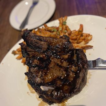 Yard House - Korean Ribeye with chili garlic fries. - New American Near Me - Brea, California Yard House - Korean Ribeye with chili garlic fries. - New American Near Me - Brea, California