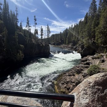 Tours In Color - River flowing downstream to the Upper Yellowstone Falls - Tours Near Me - Jackson, Wyoming Tours In Color - River flowing downstream to the Upper Yellowstone Falls - Tours Near Me - Jackson, Wyoming