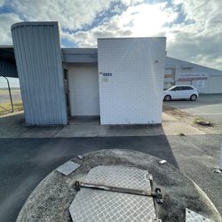 Redcliffe Airport - Bathroom. Covered, outdoor benches for waiting area.